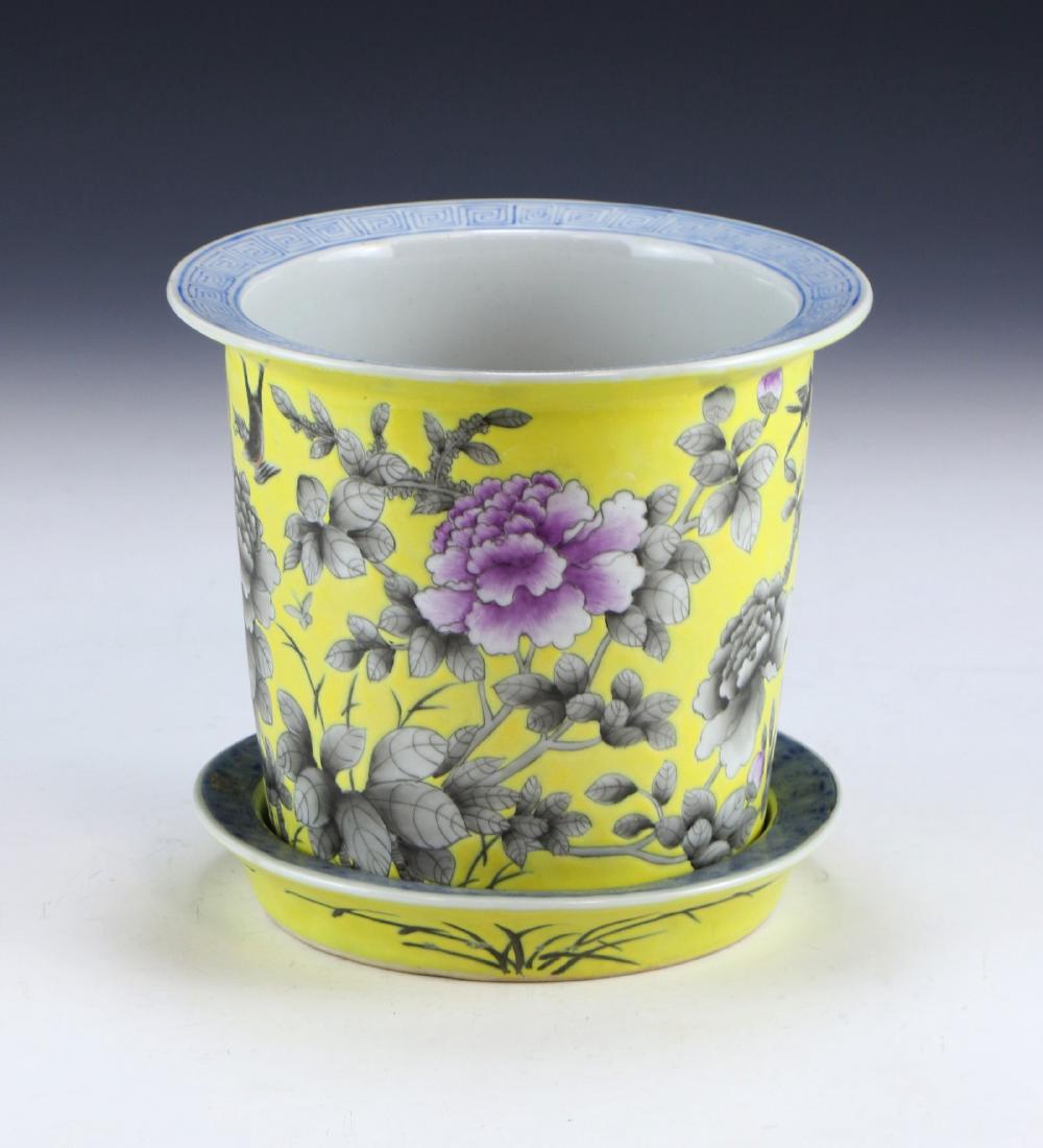 A CHINESE ANTIQUE FAMILLE ROSE GRISAILLE STYLE: A Chinese Antique Famille Rose Grisaille Style Porcelain Jardiniere & Stand: Of Cylindrical Form, Body Finely Painted With Blooming Flowers Amid Continuous Stems Set Against An Evenly Glazed Yellow Ba