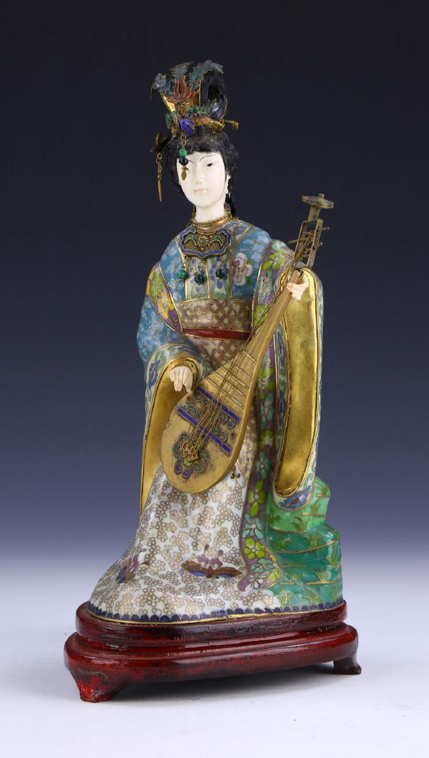 A CHINESE ANTIQUE CLOISONNE & BONE FIGURE GROUP: 金銀累絲嵌寶琺瑯仕女立像A CHINESE ANTIQUE CLOISONNE & BONE FIGURE GROUP: with extremely detailed filigree artwork and inlaid wit