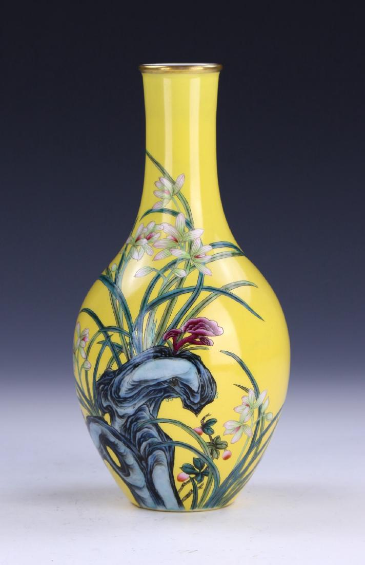 A CHINESE ANTIQUE FAMILLE ROSE PORCELAIN VASE: A Chinese Antique Famille Rose Porcelain Vase: Of Ovoid Form, Well Potted With A Cylindrical Neck And Gilt Glazed Rim, Body Finely Painted With Sprouting Blossoms Of Mixed Tones Amid Long Stems And Ro