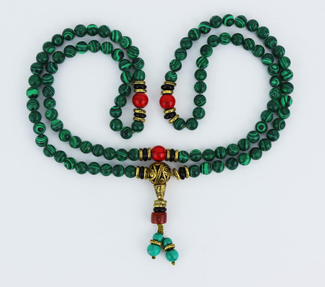 A CHINESE MALACHITE BEADED PRAYER NECKLACE (1 of 2)