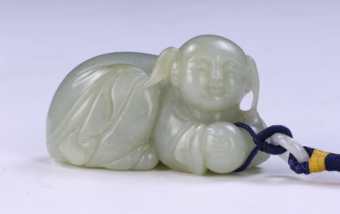 A CHINESE JADE CARVED PENDANT (1 of 3)
