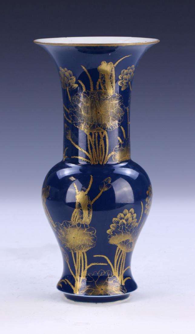 A CHINESE ANTIQUE GILT & BLUE GLAZED PORCELAIN VASE: A Chinese Antique Gilt & Blue Glazed Porcelain Vase: Of Baluster Form, Body Finely Painted With Blooming Flowers And Lily Pads in A Gilt Finish Set Against An Evenly Glazed Blue Body, Six Character GU