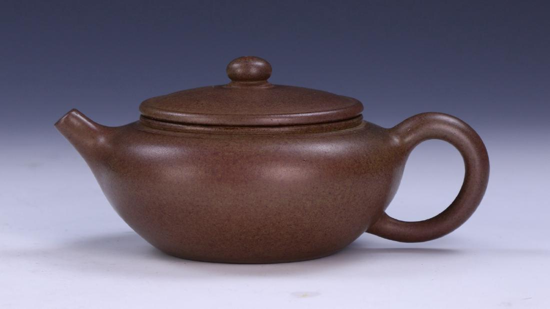 A CHINESE YIXING ZISHA TEAPOT BY TIE HUA XUAN ZHI (1 of 5)