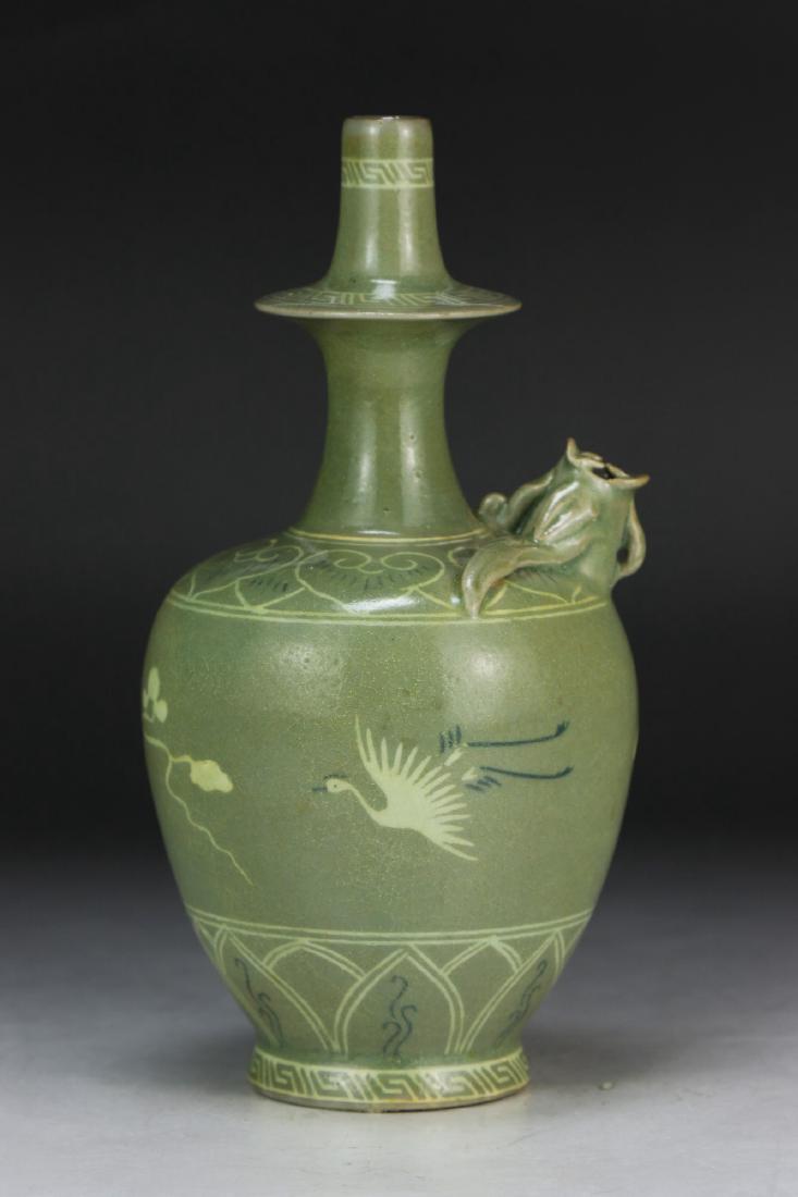 A KOREAN ANTIQUE CELADON GLAZED PORCELAIN KENDI VASE (1 of 7)