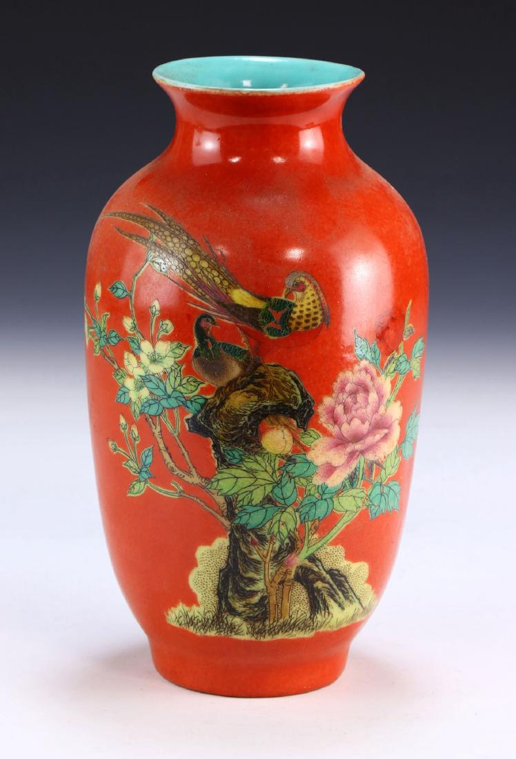 A CHINESE ANTIQUE FAMILLE ROSE PORCELAIN VASE: A Chinese Antique Famille Rose Porcelain Vase: Of Ovoid Form, Wide Neck Rising To An Outwardly Flared Rim, Body Finely Painted Along One Side With Two Birds At Rest On A Branch Amid Blooming Flowers O