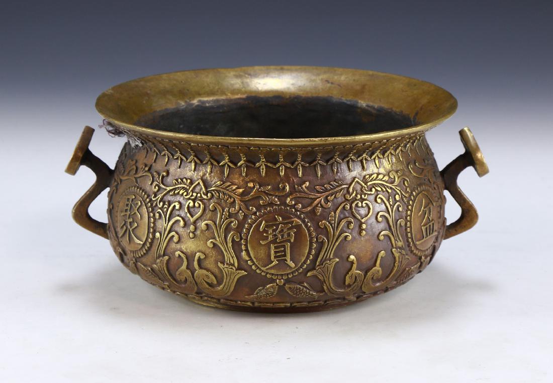 A CHINESE ANTIQUE BRONZE CENSER: A Chinese Antique Bronze Censer: Of Compressed Globular Form, Rising From A Base Rested On Low Feet To A Lipped Rim, Body Flanked On Each Side By Swirling Handles, Exterior Finely Molded With Six Meda