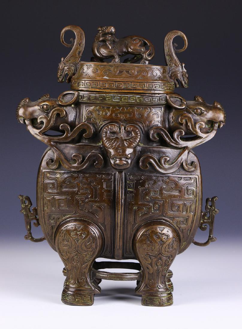 A CHINESE ANTIQUE BRONZE LIDDED CENSER (1 of 5)