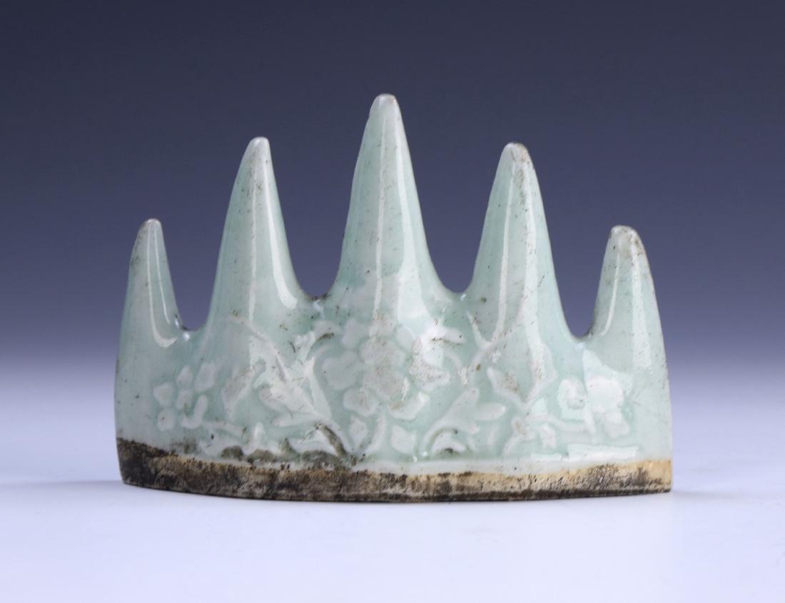 A CHINESE ANTIQUE CELADON GLAZED PORCELAIN BRUSH REST (1 of 3)