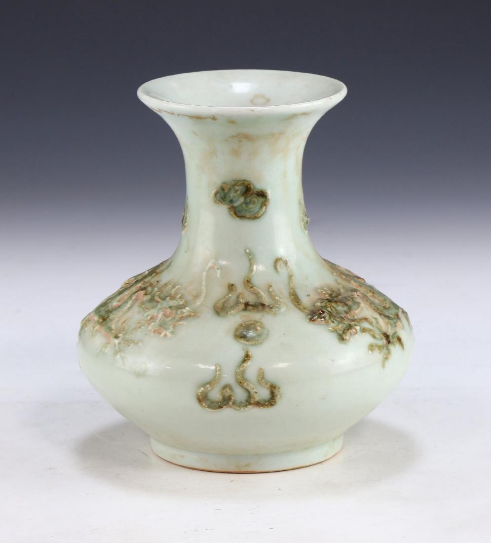 A CHINESE ANTIQUE EMBOSSED CELADON GLAZED PORCELAIN (1 of 7)
