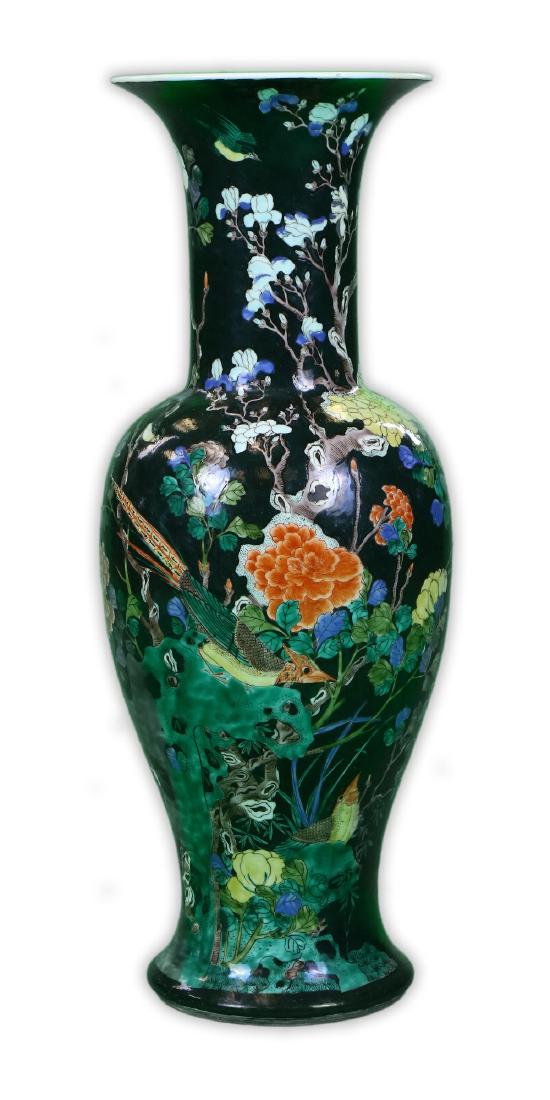 A CHINESE ANTIQUE SUSANCAI FAMILLE NOIRE PORCELAIN ZUN: A Chinese Antique Susancai Famille Noire Porcelain Zun Vase: Finely Potted And Of Baluster Form, Exterior Body Elegantly Painted With Birds Perched Amid Sprouting Blossoms Of Mixed Tones And Rockery,