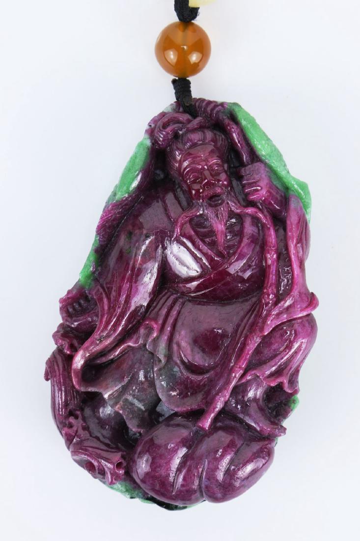 A RUBY MATRIX CARVED PENDANT (1 of 3)