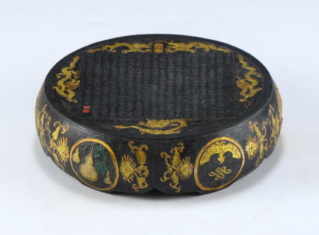 A CHINESE ANTIQUE GILT INK BRICK (1 of 6)