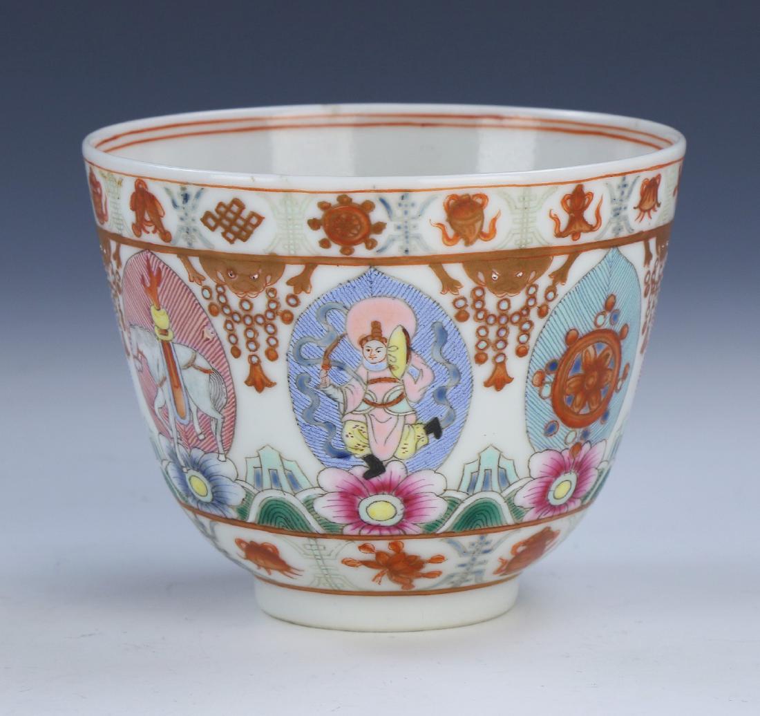 A CHINESE ANTIQUE FAMILLE ROSE PORCELAIN CUP: A Chinese Antique Famille Rose Porcelain Cup: Well Potted With Rounded Sides, Exterior Body Elaborately Painted With Alternating Celestial Being And Nature Scene Panels, Shown Flanked By Sprouting Blo