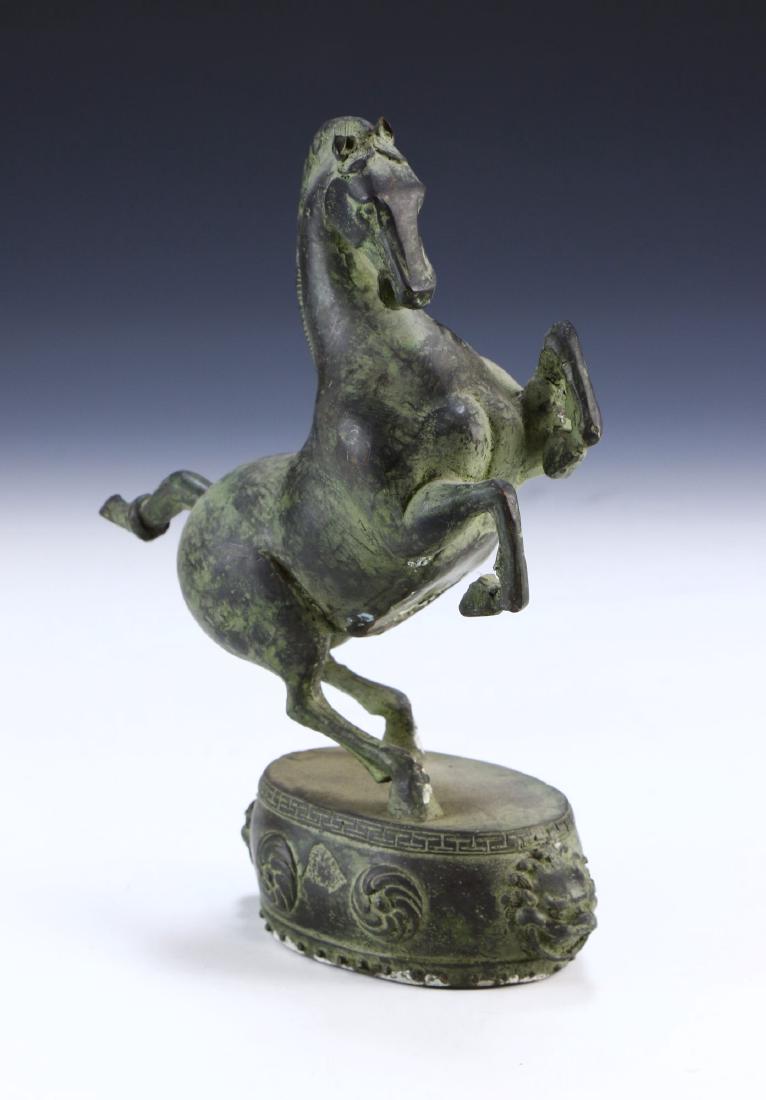 A CHINESE ANTIQUE BRONZE HORSE FIGURE (1 of 4)