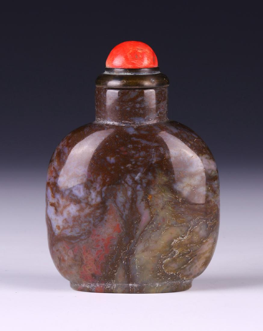 A CHINESE ANTIQUE PEKING GLASS SNUFF BOTTLE: A Chinese Antique Peking Glass Snuff Bottle: Rising To A Domed Lid, The Semi Translucent Glass Of Mottled Grey And Brown Tones; Size: H: 3-3/4" (9.53cm)