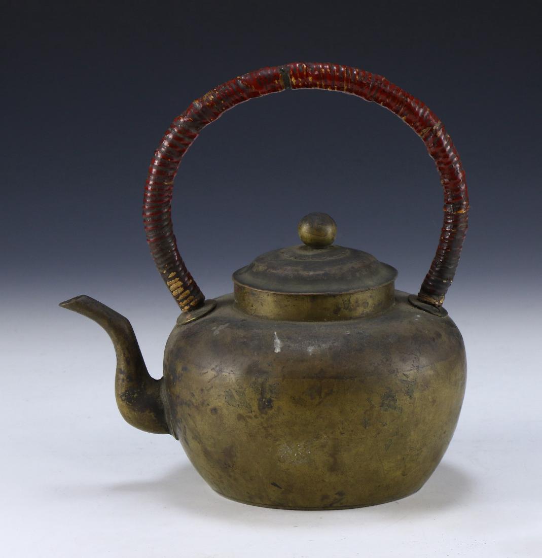 A CHINESE ANTIQUE BRASS TEAPOT