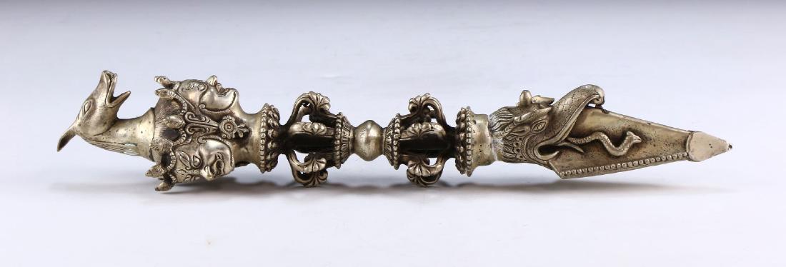 A TIBETAN SILVERED RITUAL ITEM (1 of 5)