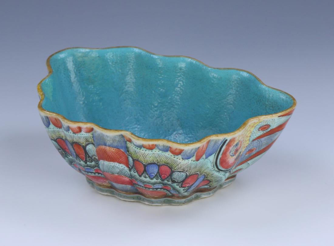 A CHINESE ANTIQUE FAMILLE ROSE PORCELAIN BOWL: A Chinese Antique Famille Rose Porcelain Bowl: Well Potted With Rounded Sides, Exterior Body Finely Painted As A Polychrome Butterfly, Six Character Mark On The Base in Iron Red Within A Double Square