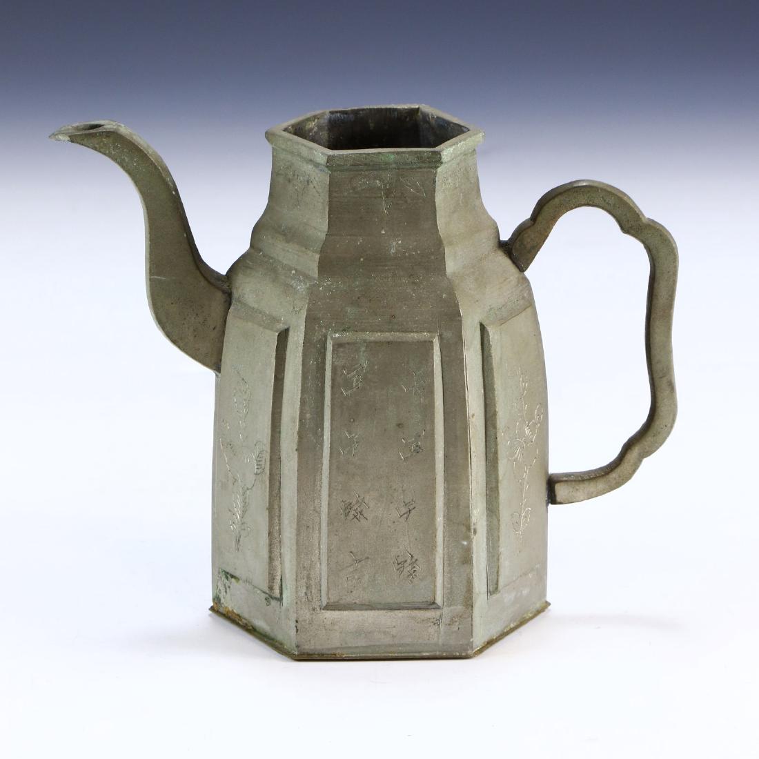 A CHINESE ANTIQUE PEWTER PITCHER (1 of 4)