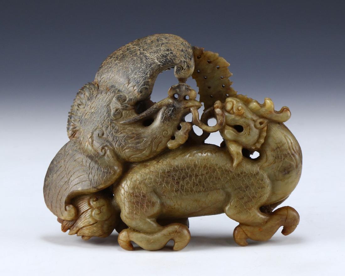 A CHINESE ANTIQUE ARCHAIC JADE CARVED FIGURE GROUP (1 of 6)