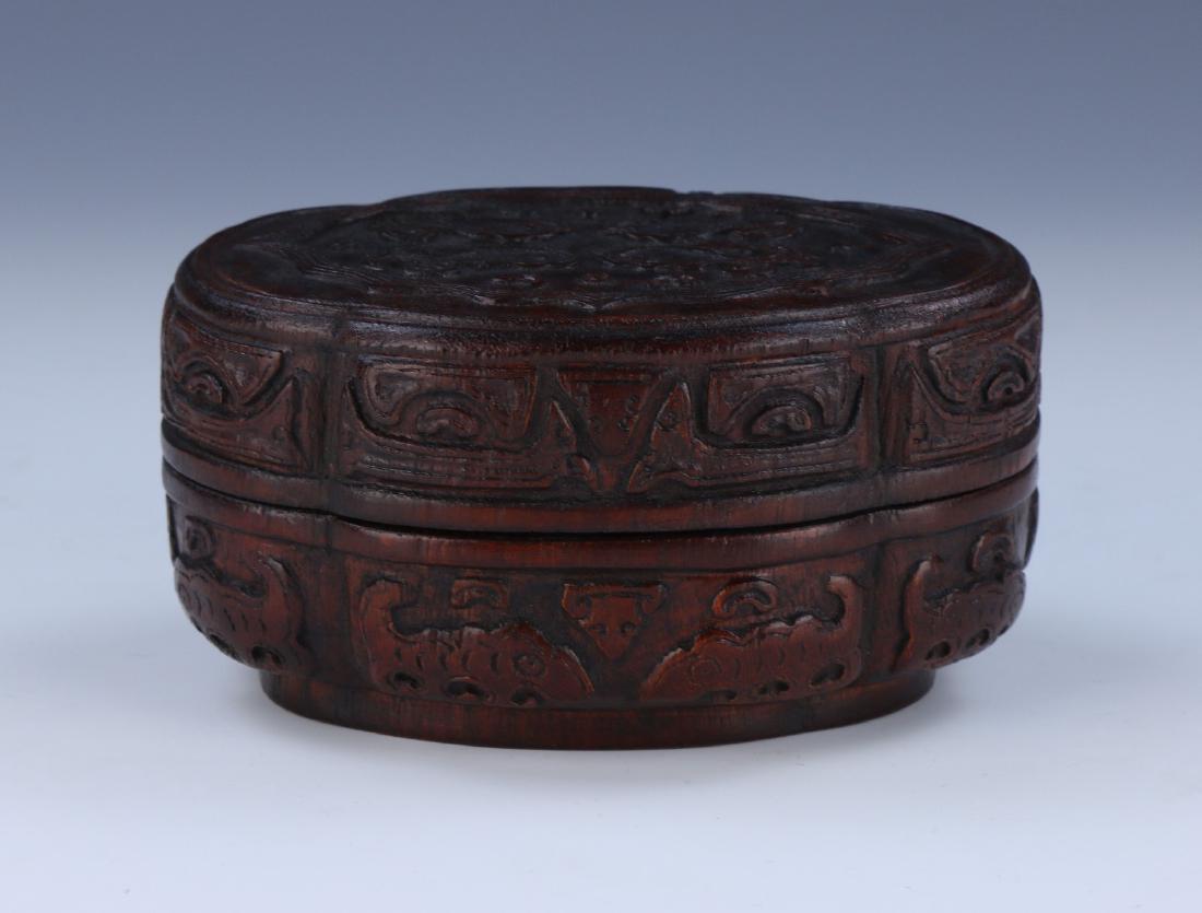 A CHINESE ANTIQUE AGARWOOD CARVED LIDDED TRINKET BOX (1 of 5)