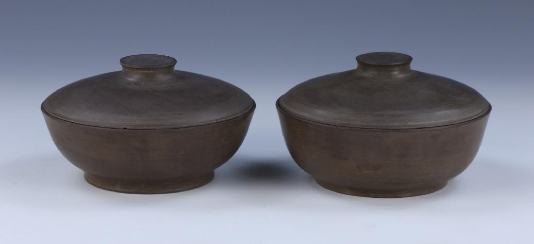 PAIR CHINESE ANTIQUE DUAN STONE LIDDED BOWLS: 端石雕蓋碗一對Pair Chinese Antique Duan Stone Lidded Bowls: Finely Carved With Rounded Sides, Rising From Bases Rested On Low Feet To Domed Lids Topped With F