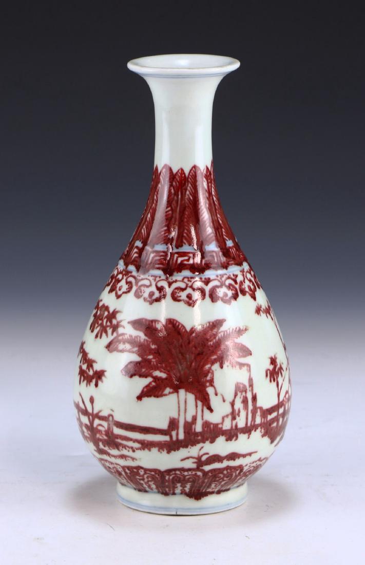 A CHINESE ANTIQUE UNDERGLAZED RED PORCELAIN VASE (1 of 4)