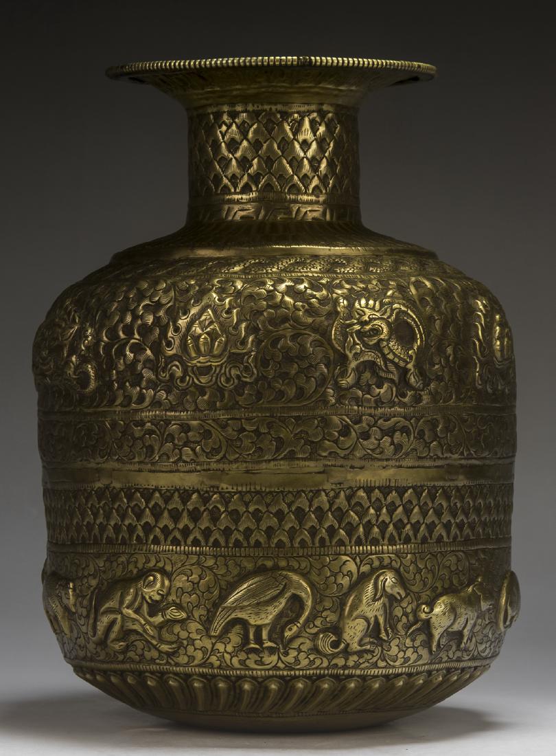 A TIBETAN ANTIQUE BRONZE VASE (1 of 3)