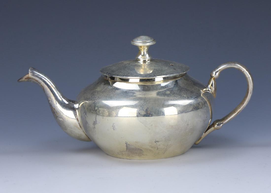 A CHINESE ANTIQUE SILVER TEAPOT (1 of 4)