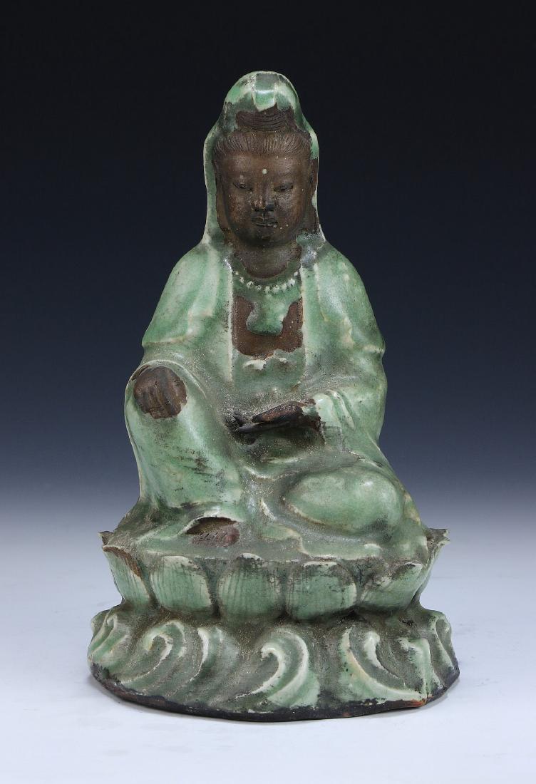A CHINESE ANTIQUE CELADON GLAZED FIGURE (1 of 3)