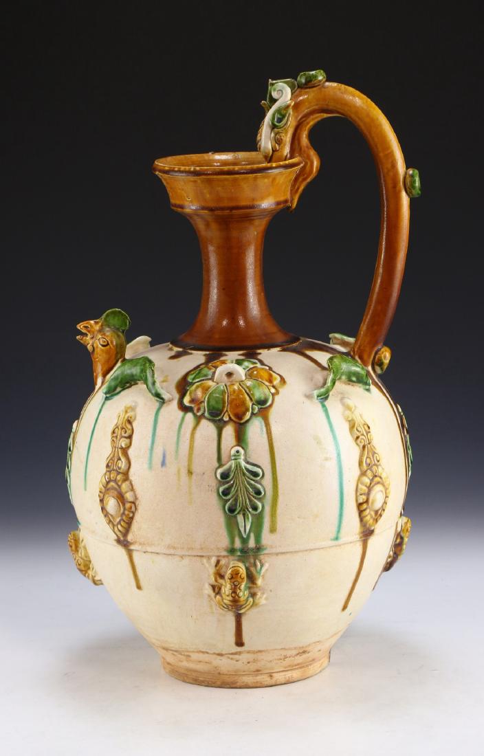 A BIG CHINESE ANTIQUE SANCAI GLAZED PORCELAIN WINE POT: A Big Chinese Antique Sancai Glazed Porcelain Wine Pot: Of Globular Form Rising To A Cylindrical Neck And Wide Rim, One Side Molded With A Long C-Shaped Handle And The Other With A Chicken Head Spout,