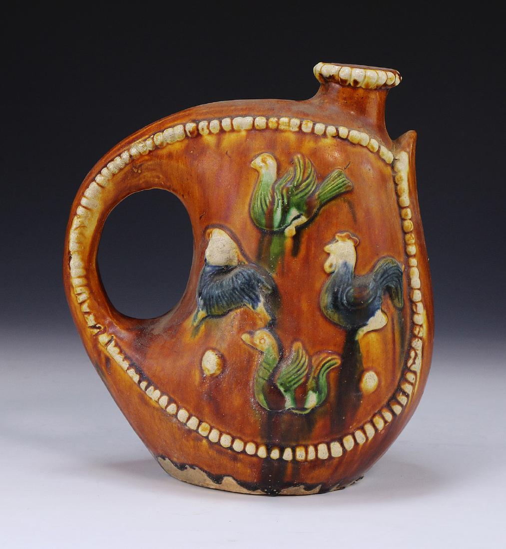 A CHINESE ANTIQUE POLYCHROME SANCAI PITCHER (1 of 4)