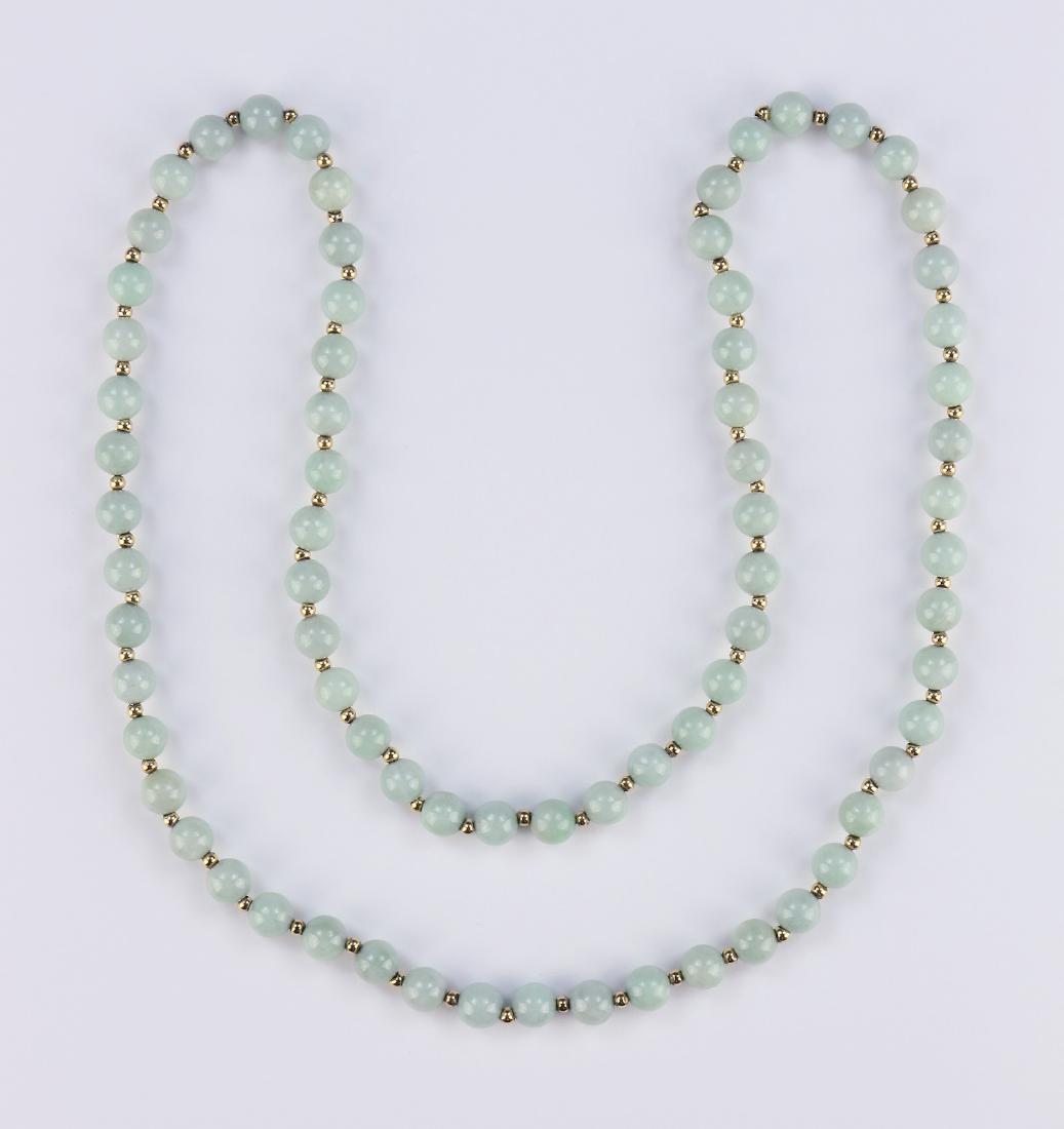 A CHINESE JADEITE BEADED NECKLACE (1 of 2)