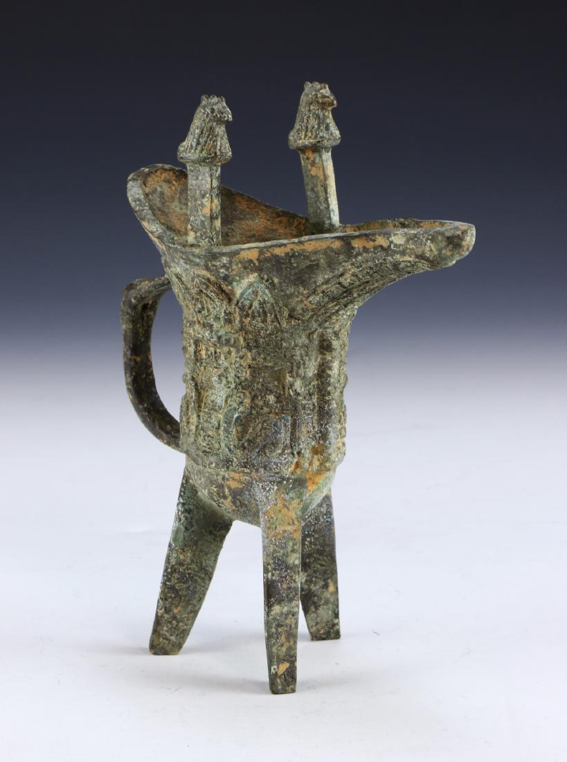 A CHINESE BRONZE JUE CUP (1 of 5)