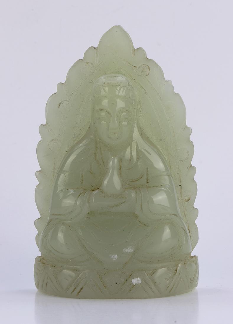 A CHINESE CELADON JADE CARVED FIGURE OF GUANYIN (1 of 3)