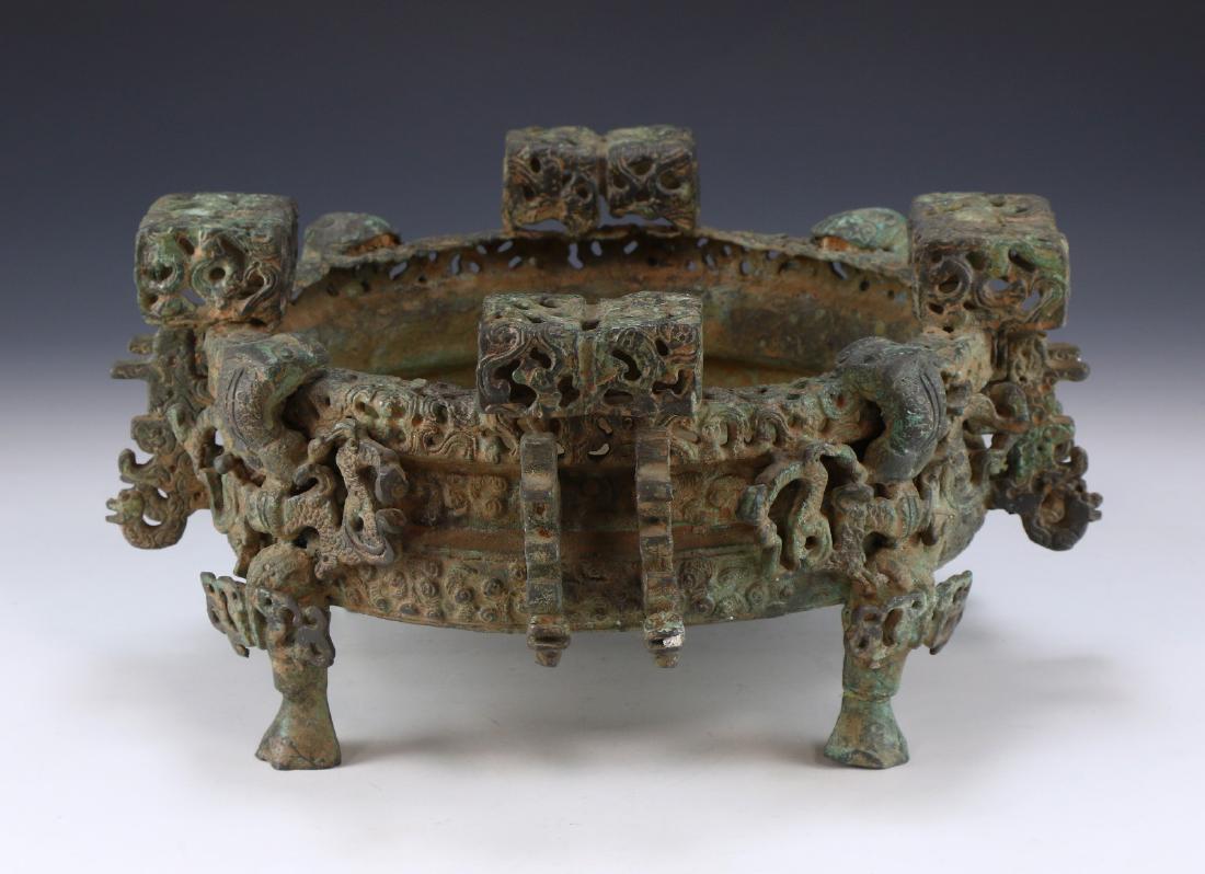 A CHINESE ARCHAIC BRONZE TRIPOD CENSER (1 of 6)