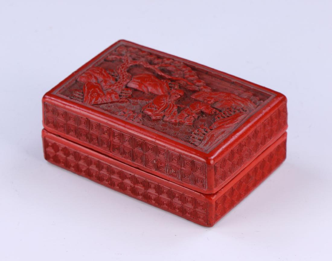 A CHINESE RED CINNABAR LACQUER LIDDED CASE (1 of 4)