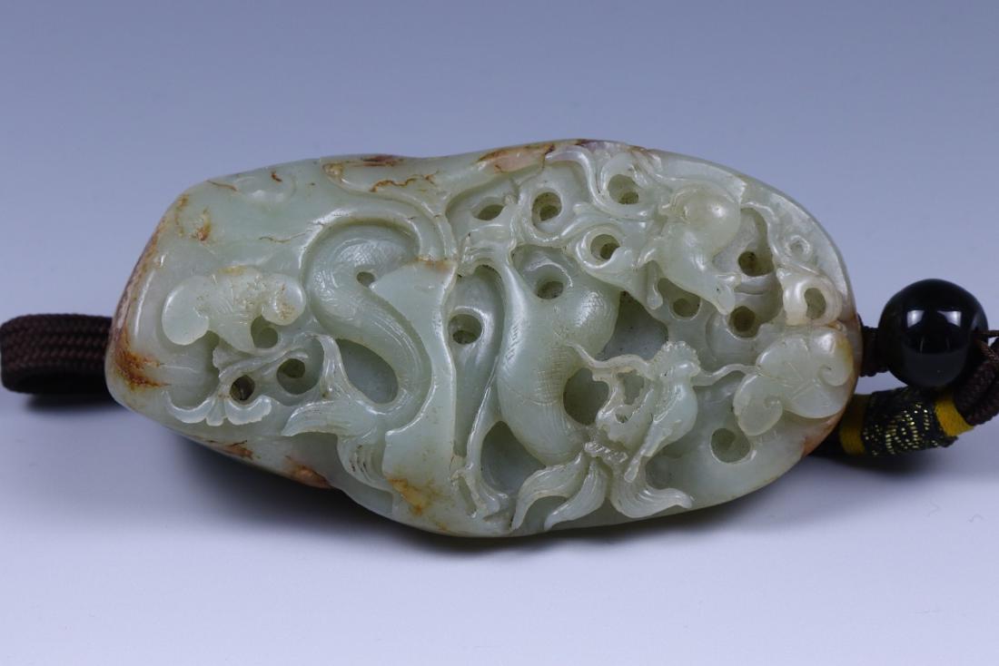 A BIG JADE CARVED PENDANT (1 of 2)