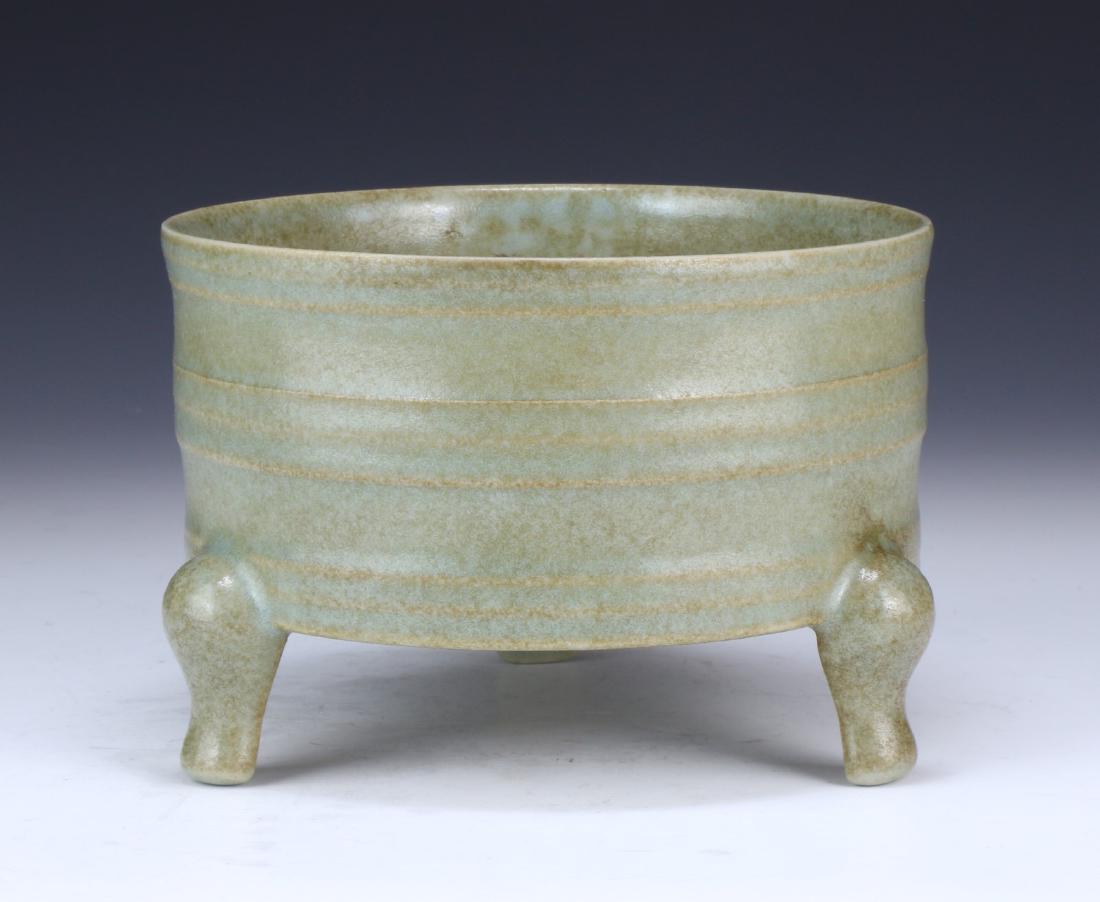 A CHINESE CELADON GLAZED TRI-POD XI CENSER (1 of 4)