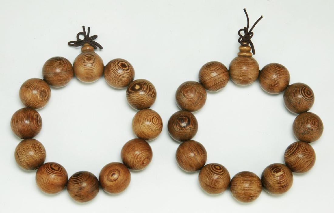 PAIR CHINESE CARVED AGARWOOD BRACELETS (1 of 4)