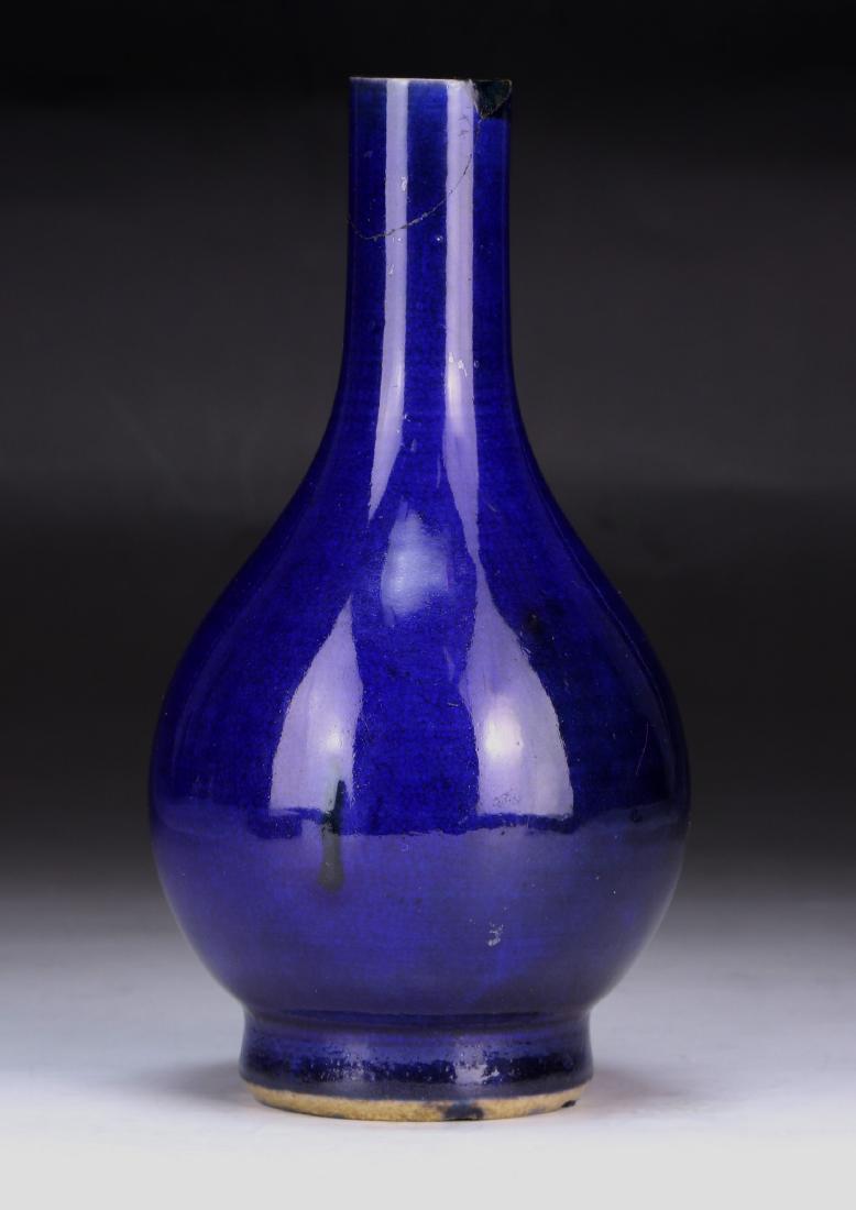 A CHINESE ROYAL BLUE GLAZED PORCELAIN VASE (1 of 3)