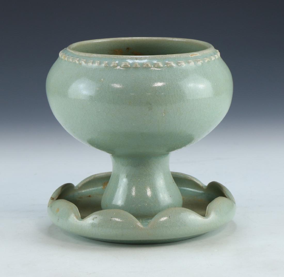 A CHINESE CELADON GLAZED PORCELAIN STEM VESSEL (1 of 4)