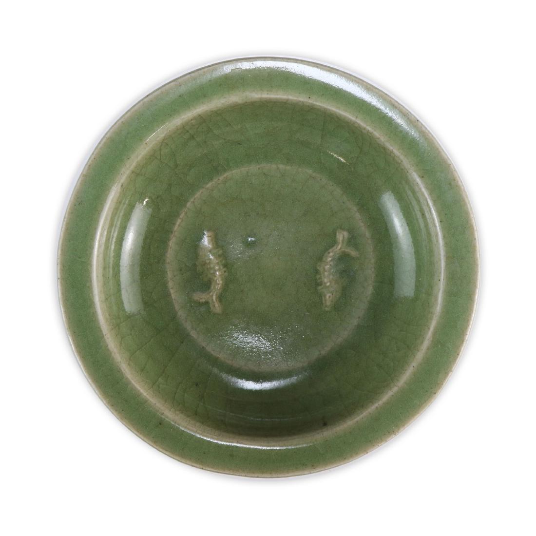 A CHINESE CELADON GLAZED PORCELAIN PLATE (1 of 4)
