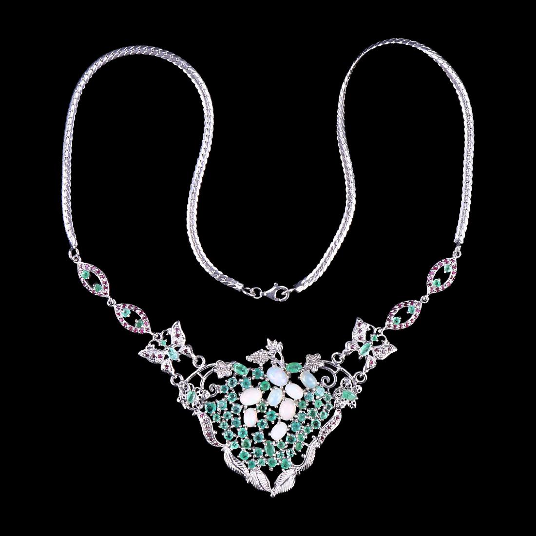 A NATURAL EMERALD, PEARL, & RUBY NECKLACE (1 of 3)