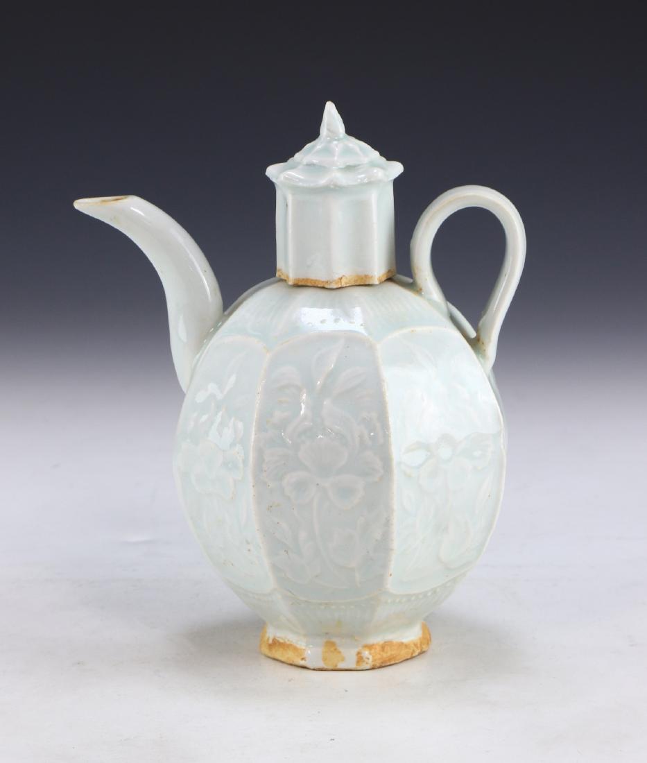 A CHINESE CELADON GLAZED PORCELAIN TEAPOT (1 of 6)