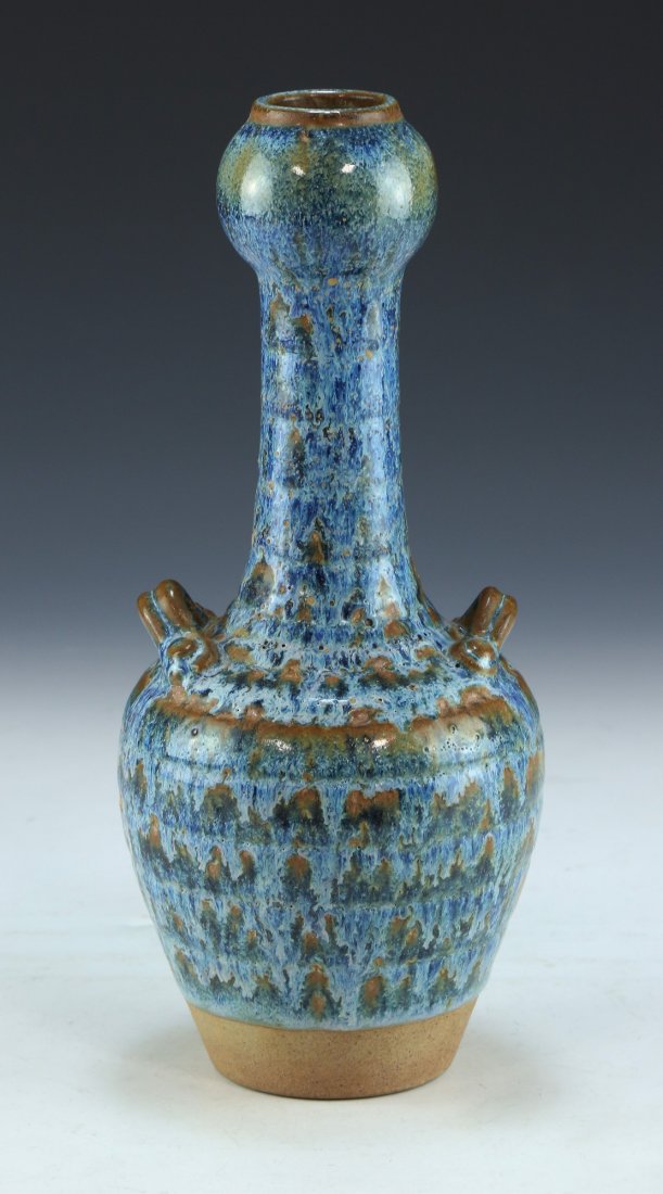 A CHINESE FLAMBE GLAZED PORCELAIN VASE (1 of 6)