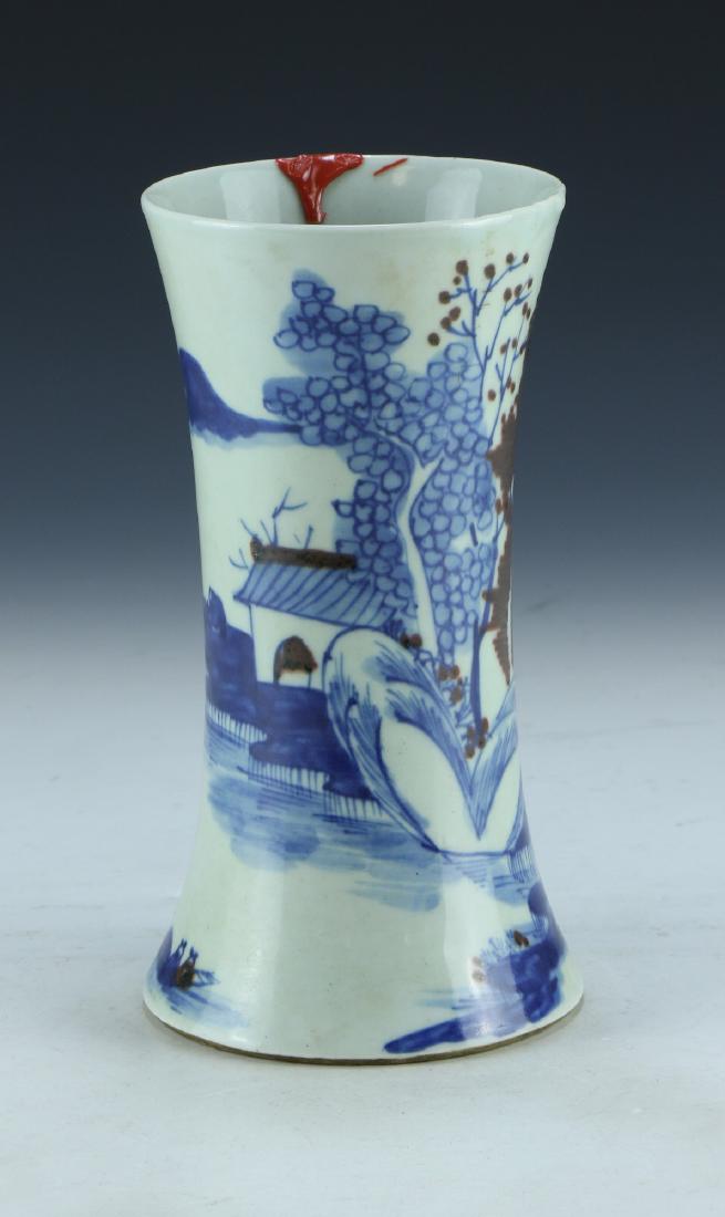 A CHINESE BLUE & WHITE UNDERGLAZED RED PORCELAIN VASE (1 of 4)