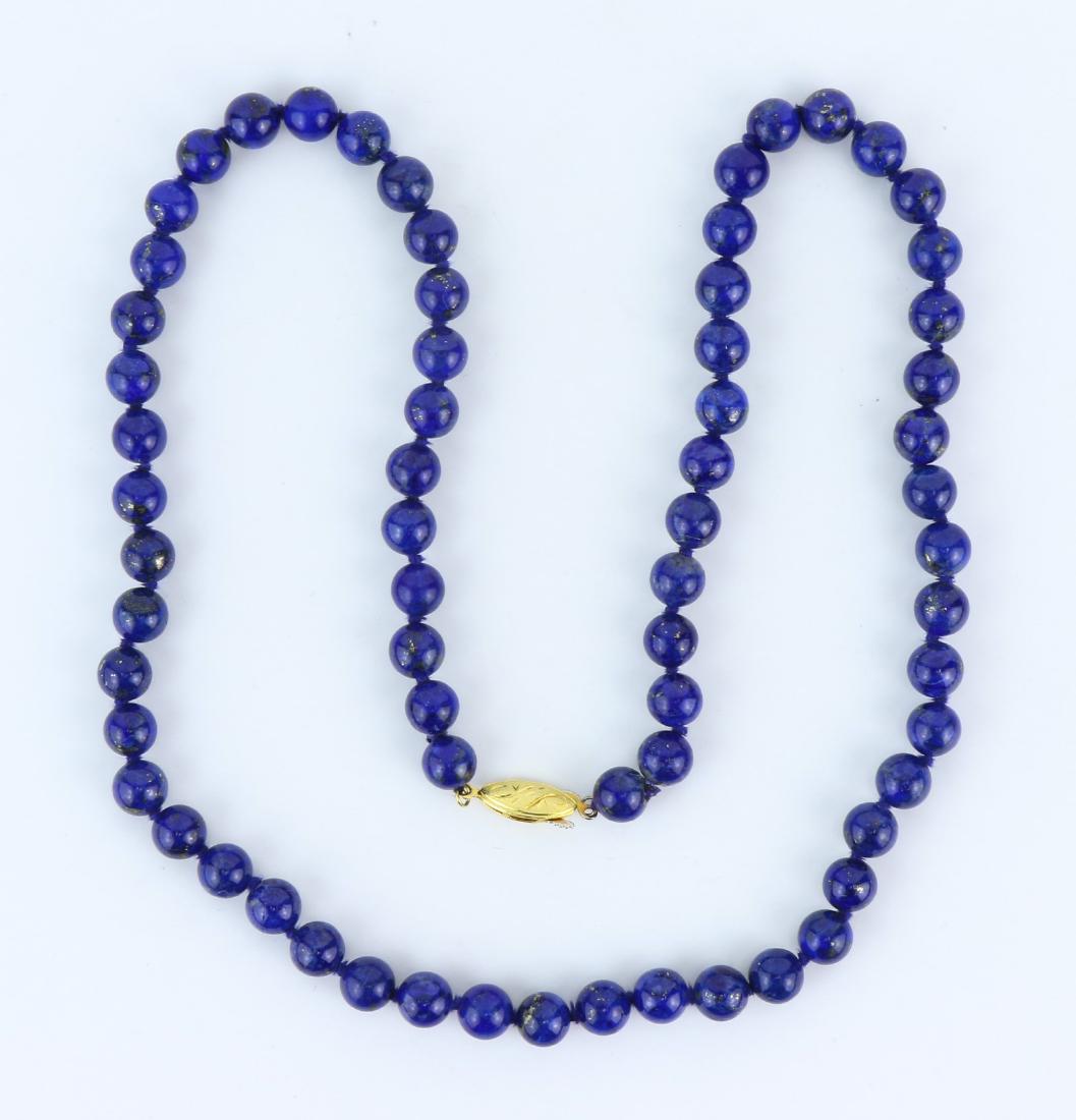 A LAPIS LAZULI BEADED NECKLACE (1 of 2)