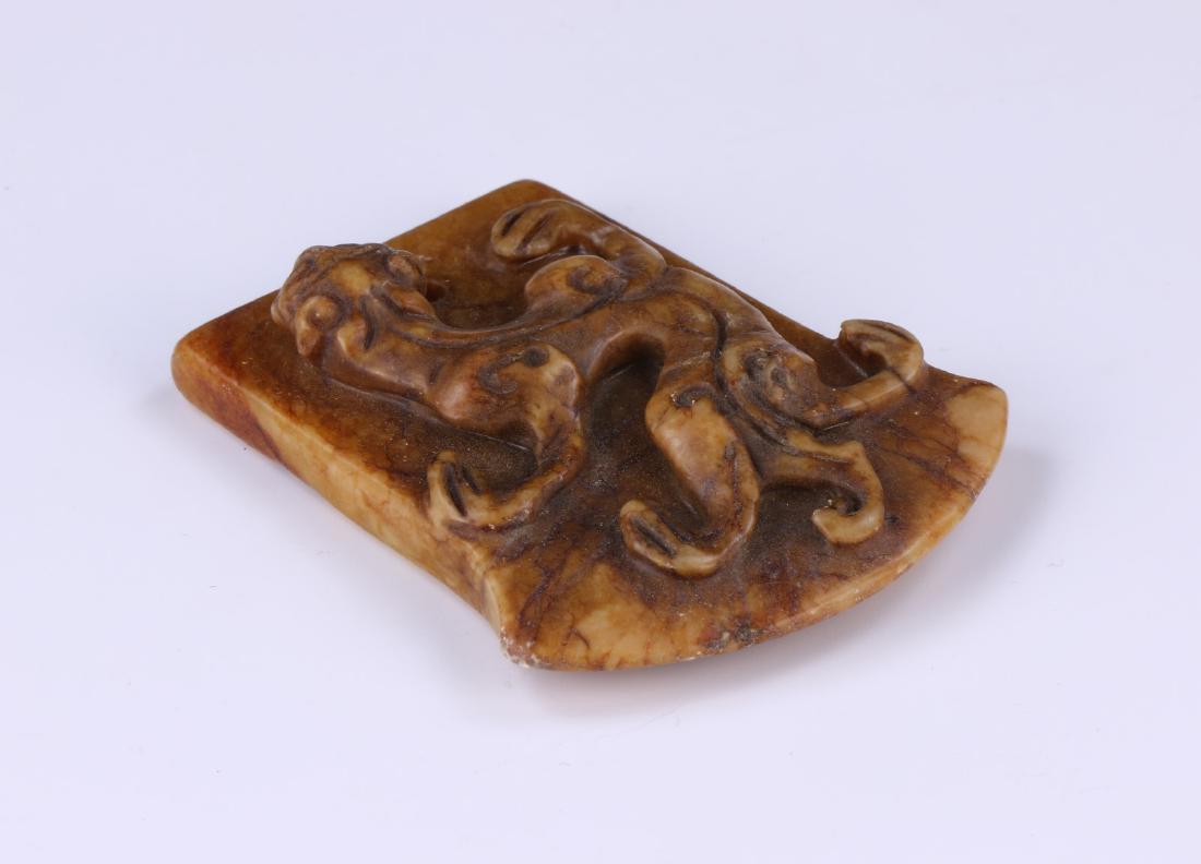 A CHINESE ARCHAIC JADE CARVING (1 of 3)