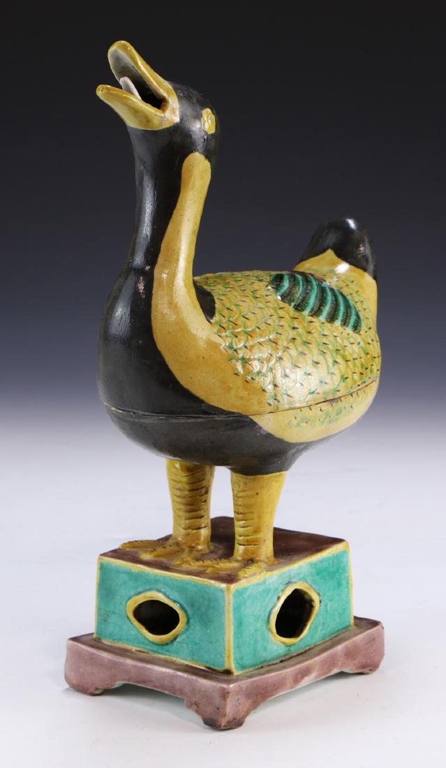 A CHINESE SECTIONAL SUSANCAI PORCELAIN DUCK: A Chinese Sectional Susancai Porcelain Duck: Shown Standing On A Foursquare Foundation With Neck Outstretched, Head Raised And Beak Ajar, A Six Character Chenghua Mark Within A Double Square in Deep C